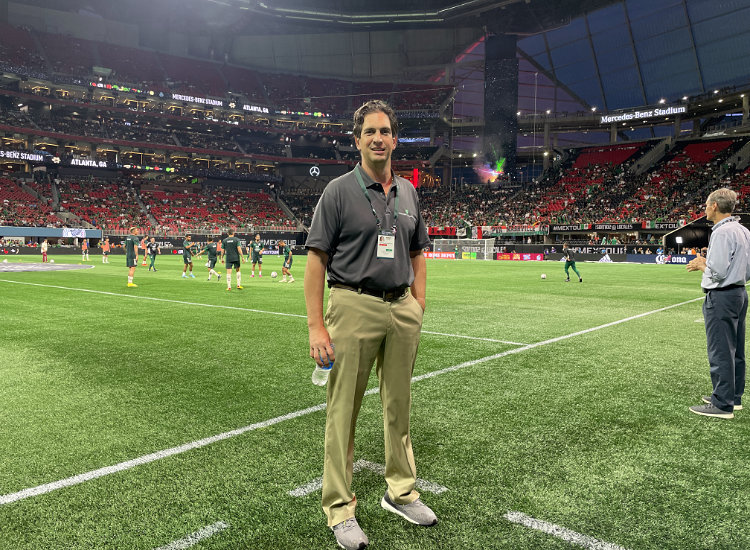 Dr. Dominic Carreira at the Mexico-Paraguay soccer game